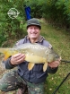 Wally Pickering 10lbs 2oz carp. hi I got this carp fishing for them and large roach in a friends pond east riding .great markings.

gonna be even better when it reaches 20 lb or so...