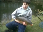 Liam Jones 15lbs 8oz carp from tackeroo using dynamite baits.