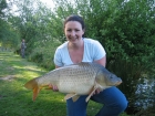 Elizabeth Fletcher 24lbs 10oz Common Carp from Les Burons Carp Fishing using Mainline Fusion.. Caught fishing to island in 2 feet of water. Caught using Century NG Rod, Shimano Baitrunner reel, Fox