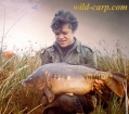 21lbs 12oz Mirror Carp from Hollybush. - His first carp over 20lb, caught during gale-force winds way beack in 1970. A HUGE fish at the time...and still strong in my memories. Bait was a small chunk