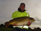 Juan Coetzee 37lbs 8oz Common Carp from Baden Hall Fisheries using richworth.. cuaght  on KG1 boilie and double maize