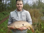 15lbs 8oz common carp from Private Pool using cotswald.. I LEDGERED A 16 MM TUTI FRUTI POP UP AT APPROX 40 YARDS OUT WITH A SCATTERING OF ABOUT 40 12MM PINAPPLE BOILIES    ( LINE 8ib  to a size 6