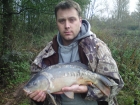 8lbs 4oz mirror carp from Private Pool. ledgered worm and a bed of red maggots to a size 8 hook
