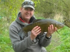Stuart Maddocks 6lbs 7oz Tench from Private Pool. Fizzing Bubbles of feeding fish gave the game away