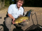 6lbs 0oz Tench from Hollwell Court Lake using Tesco's cooked muscles.. This was an unusual catch as I cast my bait just a little left of the middle of the lake in the deepest part of the lake. A