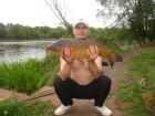 Tom Pritchard 10oz Common Carp. caught this beauty float fishing 1 foot deep very close in on meat, i didnt have any scales at the time so i dont know the weight.