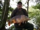 Chris Morley 23lbs 0oz mirror carp from Rookley Country Park using carp company - ice red.